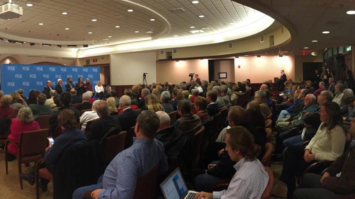 About 140 people turned out to hear a discussion on secrecy in Kansas government. Lawmakers, journalists and legal experts were panelists at the town hall meeting.