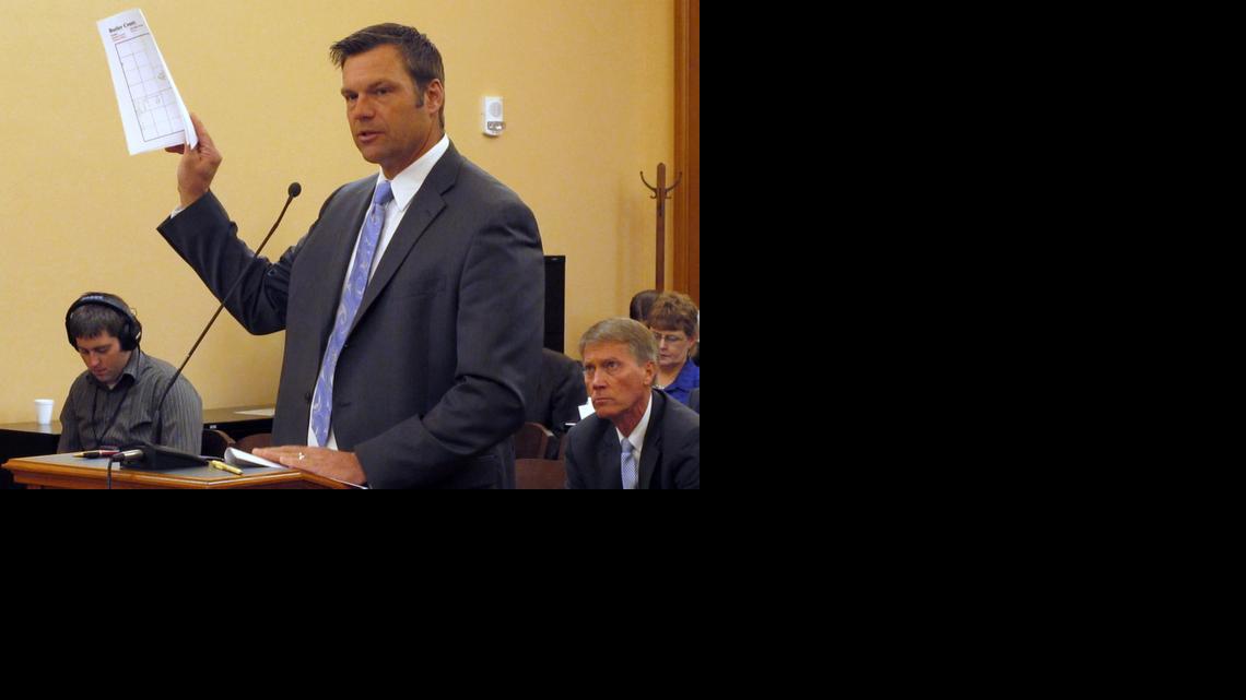 
Kansas Secretary of State Kris Kobach testified Friday during a meeting of a legislative study committee on election issues at the statehouse in Topeka. Kobach says he will revive a proposal to allow his office to prosecute election fraud cases. 
