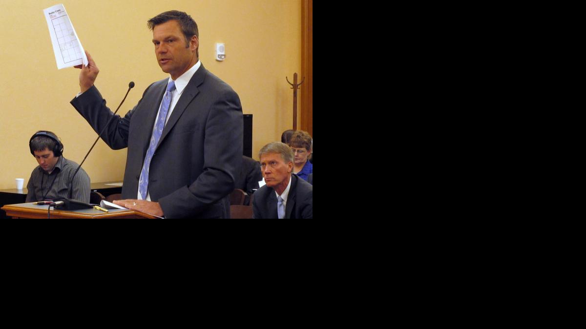 
Kansas Secretary of State Kris Kobach testified Friday during a meeting of a legislative study committee on election issues at the statehouse in Topeka. Kobach says he will revive a proposal to allow his office to prosecute election fraud cases. 
