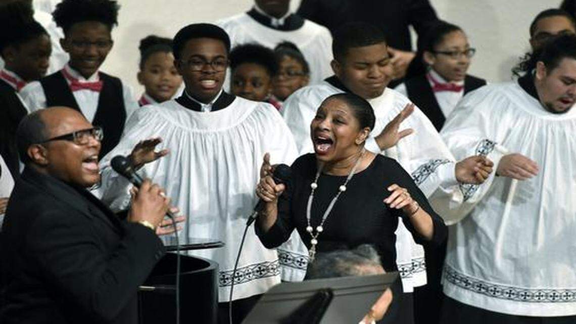 
Millie Edwards and Ah’Lee Robinson (left) joined with the Kansas City Boys Choir and Kansas City Girls Choir in a rendition of “Stand by Me” during Sunday’s Martin Luther King Jr. Interfaith Service at Community Christian Church.
