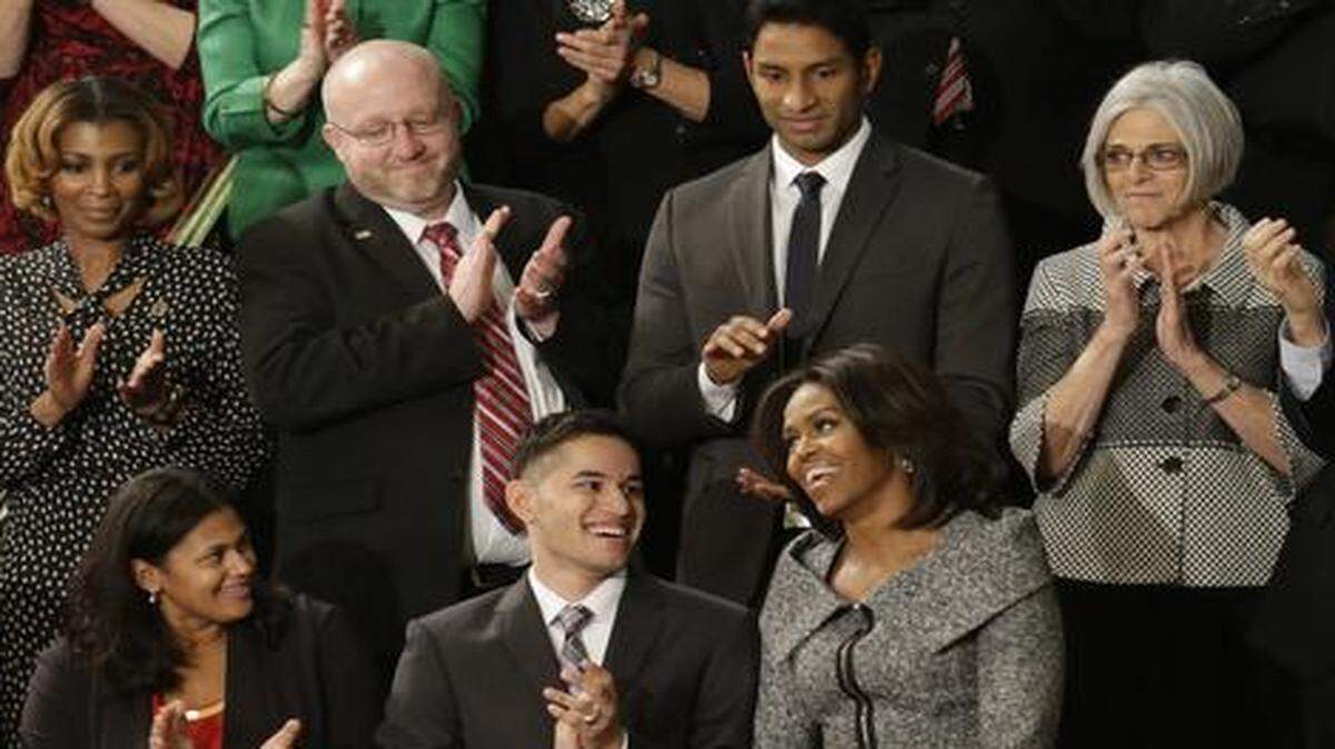 
Victor Fugate (top center) of Butler, Mo., was among invited guests sitting near first lady Michelle Obama during Tuesday night’s State of the Union speech. While in Washington, Fugate also met briefly Tuesday afternoon with President Barack Obama in the White House Oval Office.
