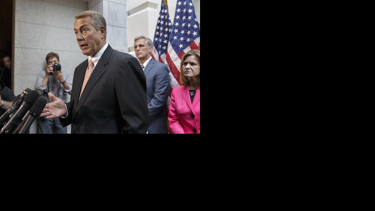 
Speaker of the House John Boehner talked with reporters Wednesday on Capitol Hill following a Republican strategy session. House Republicans want to slash President Barack Obama’s emergency spending request for the border, speed young migrants back home to Central America and send in the National Guard.
