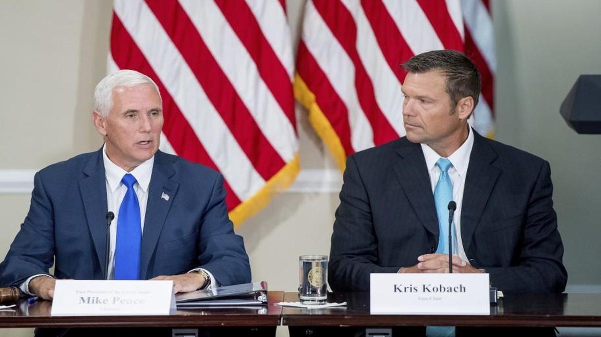 Vice President Mike Pence (left) accompanied by Kansas Secretary of State Kris Kobach, spoke during the first meeting of the Presidential Advisory Commission on Election Integrity in July.