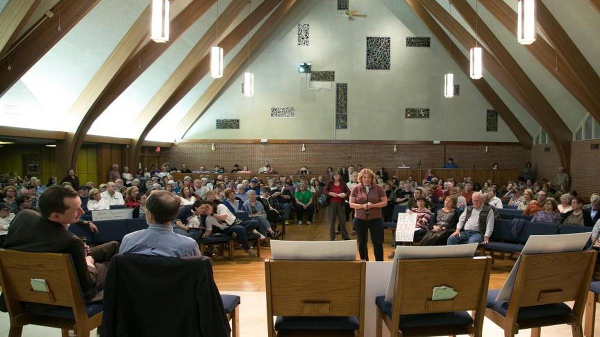 Indivisible KC held a Kansas Constituent Health Care Town Hall on Wednesday at Overland Park Christian Church. The organization said it invited Sens. Jerry Moran and Pat Roberts and Reps. Lynn Jenkins and Kevin Yoder, but all four declined the invitation. On the panel were (far left) Sean Gatewood, co-administrator of KanCare Advocates Network, and Sheldon Weisgrau, executive director of Health Reform Resource Project.