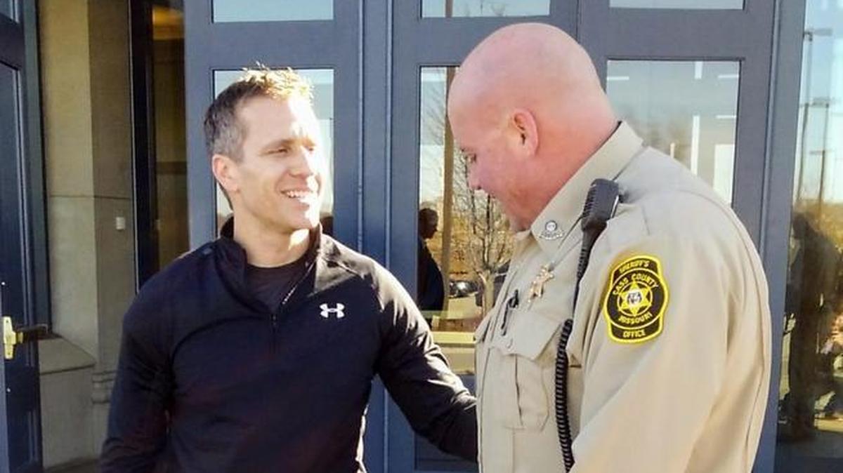 Missouri Gov. Eric Greitens (left) met with Cass County Sheriff’s Deputy Stephen Valentich (right) and Cass County Sheriff’s K-9 Champ on Wednesday at the KCPD Academy, where Greitens went to work out after meetings in Kansas City, according to his office.