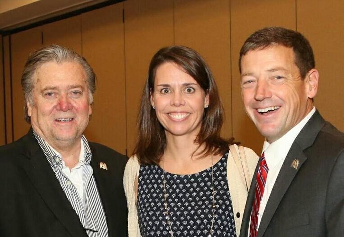 Former White House strategist Steve Bannon (left) poses with Ed Martin (right) and his wife, Carol Martin, at a Phyllis Schlafly Eagles event in St. Louis in September.