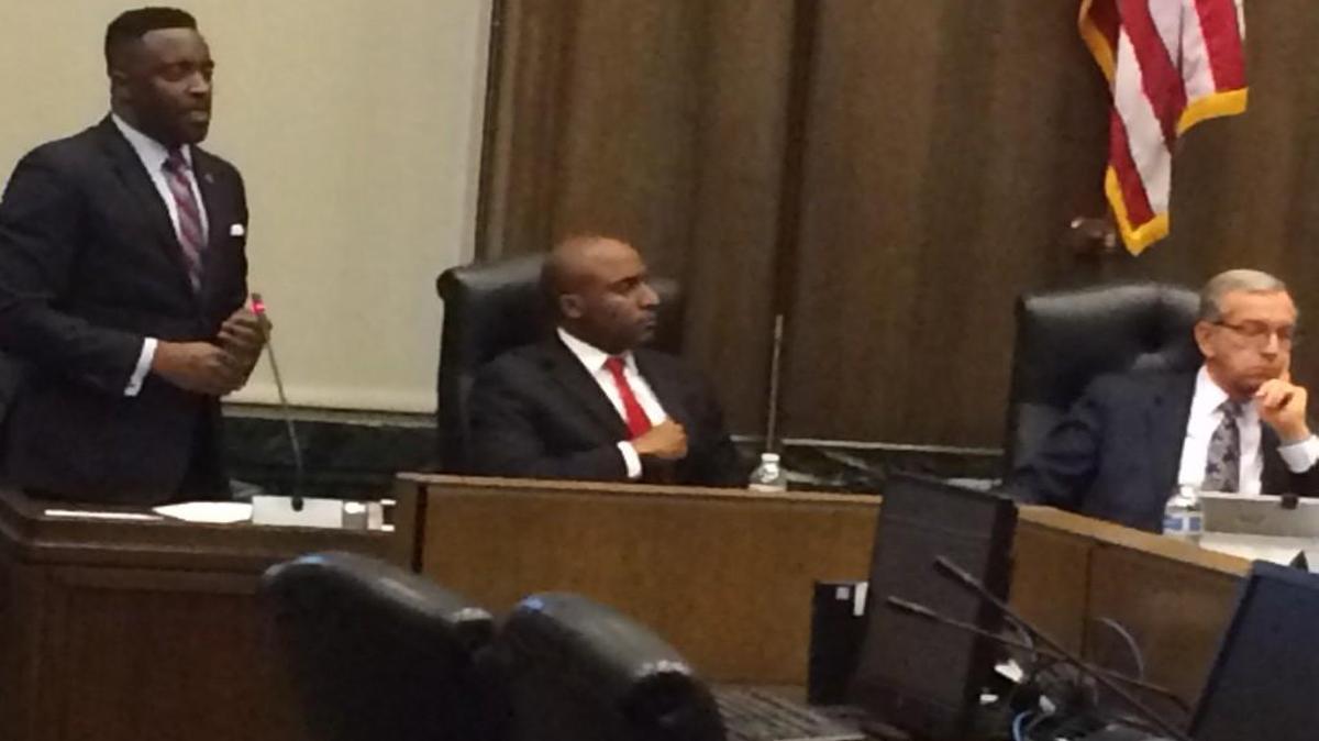 The Kansas City Council voted Thursday in favor of a pilot East Side tax increment financing plan. Council members Jermaine Reed (from left) and Quinton Lucas voted yes while, Councilman Dan Fowler (right) voted no.