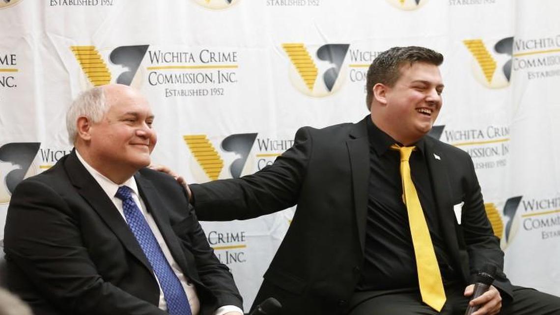 Libertarian candidate Chris Rockhold’s campaign manager Jordan Husted (center) joked with Republican Ron Estes (left) as Democrat James Thompson looked on before the start of a debate last month hosted by the Wichita Crime Commission.