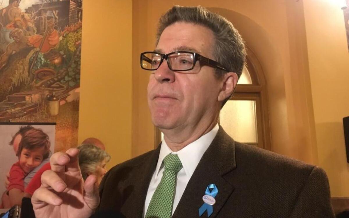 Gov. Sam Brownback has picked John Altevogt of Edwardsville for the Kansas Selective Service System, which deals with potential military drafts. The selection is drawing criticism.