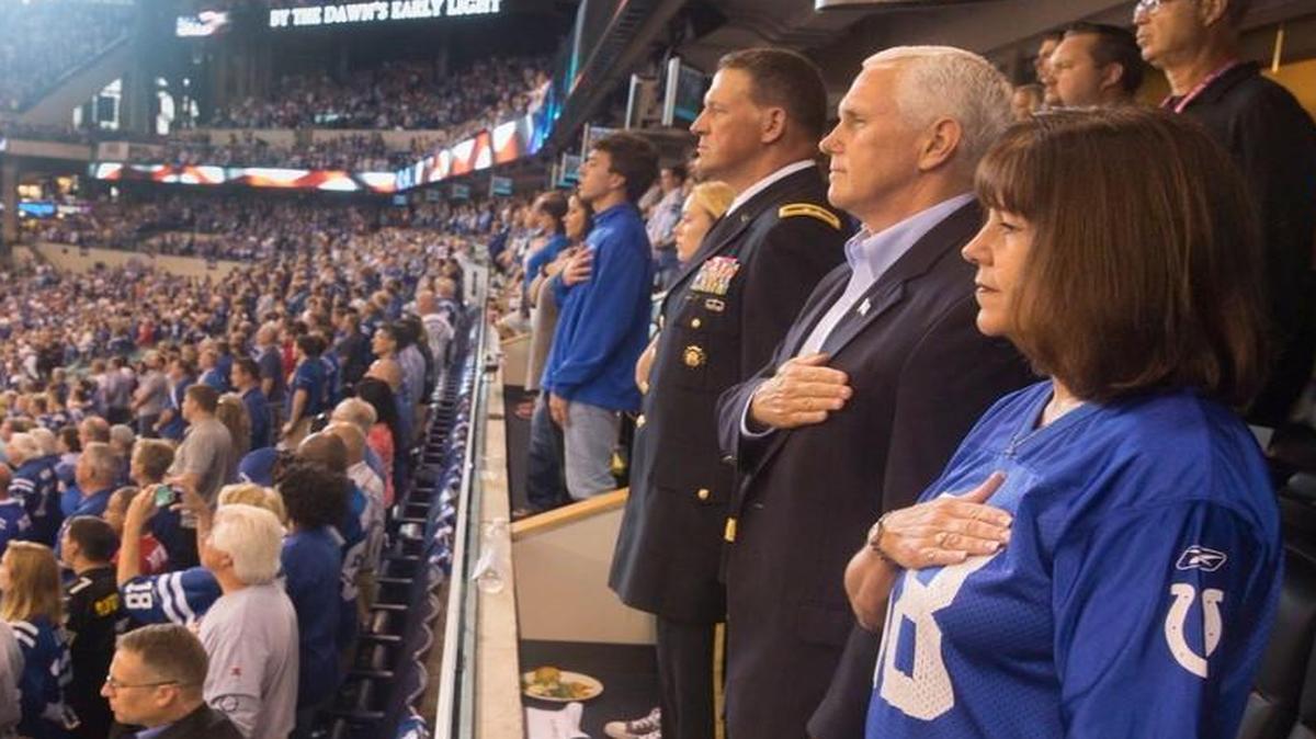 Vice President Mike Pence and his wife, Karen, stood for the national anthem at the NFL game Sunday in Indianapolis. Pence left when several 49ers knelt during the anthem. President Donald Trump had asked him to.