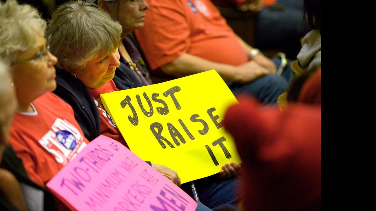 
A large crowd packed the Kanas City Council Chambers on Thursday with many in support of an increased minimum wage and others opposing it. Barbara Stubbs (left) and Mary Bay support raising the wage.

