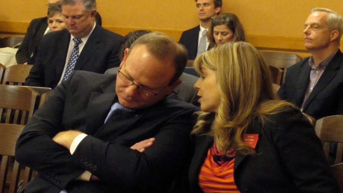 Todd White, the incoming superintendent of the Blue Valley School District, conferred with the district’s lobbyist, Dodie Wellshear, during a Senate Ways and Means Committee hearing on a new school funding plan Wednesday at the statehouse in Topeka. White supports the plan because in redistributing state dollars, it ensures that no district loses state aid.