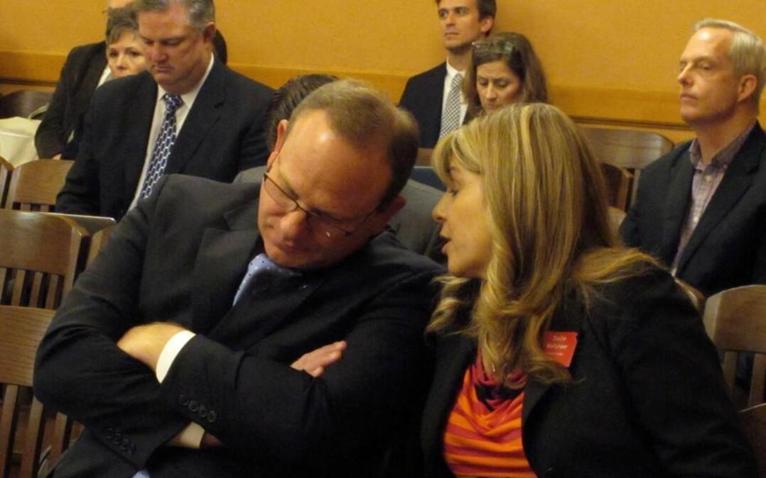 Todd White, the incoming superintendent of the Blue Valley School District, conferred with the district’s lobbyist, Dodie Wellshear, during a Senate Ways and Means Committee hearing on a new school funding plan Wednesday at the statehouse in Topeka. White supports the plan because in redistributing state dollars, it ensures that no district loses state aid.