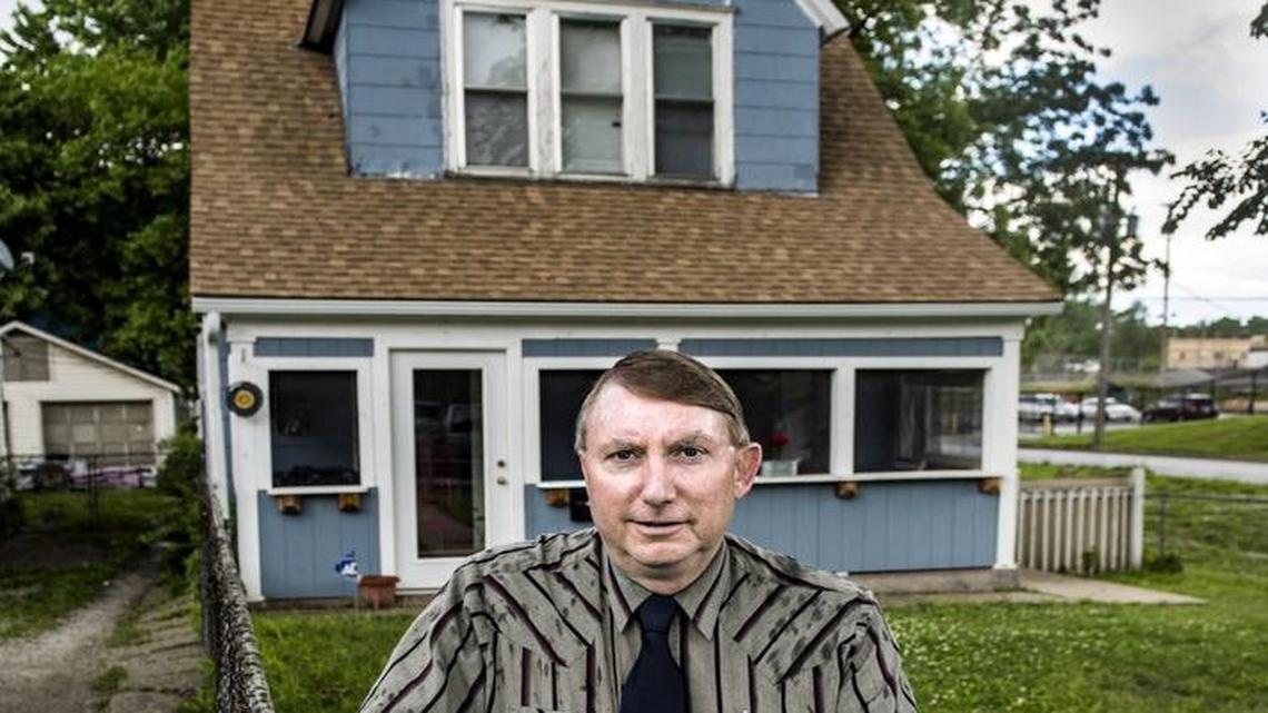 Stephen Summers stood near one of his rental homes Tuesday in Kansas City’s Northeast neighborhood. Summers owns several dozen rental properties, and he is concerned about Kansas City officials’ proposal to begin inspecting rental properties and charge fees.