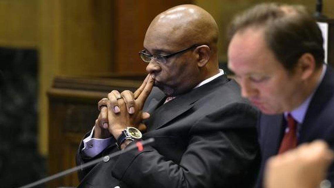 
Michael Brooks (left) resigned from the Kansas City Council late in 2014 after a former aide accused him of assault. The city on Thursday decided to settle with the accuser for $225,000.
