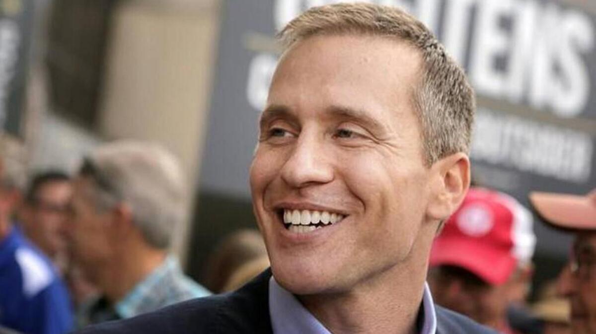 Missouri Gov. Eric Greitens has admitted he had an extramarital affair in 2015. But he denies he threatened to release a nude photograph of the woman, taken while she was blindfolded and her hands were bound, if she spoke about the affair.