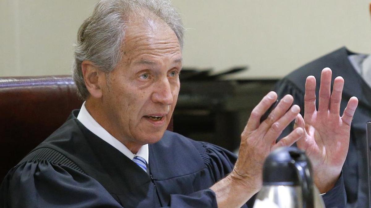 In this 2015, file photo, Shawnee County District Court Judge Franklin Theis addresses the state's attorneys during a case at the Shawnee County Courthouse in Topeka Theis ruled Dec. 31, 2018, that Kansas cannot stop telemedicine abortions, thwarting the latest attempt by state lawmakers to prevent doctors from providing pregnancy-ending pills to women they see by remote video conferences.