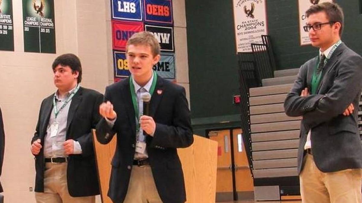 Six Kansas teens ran for governor, including Jack Bergeson (left), Tyler Ruzich (speaking) and Dominic Scavuzzo (right).