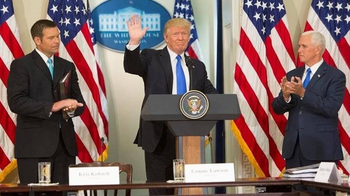 President Donald Trump last week disbanded his voter fraud commission, which had been led by Kansas Secretary of State Kris Kobach (left) and Vice President Mike Pence (right).