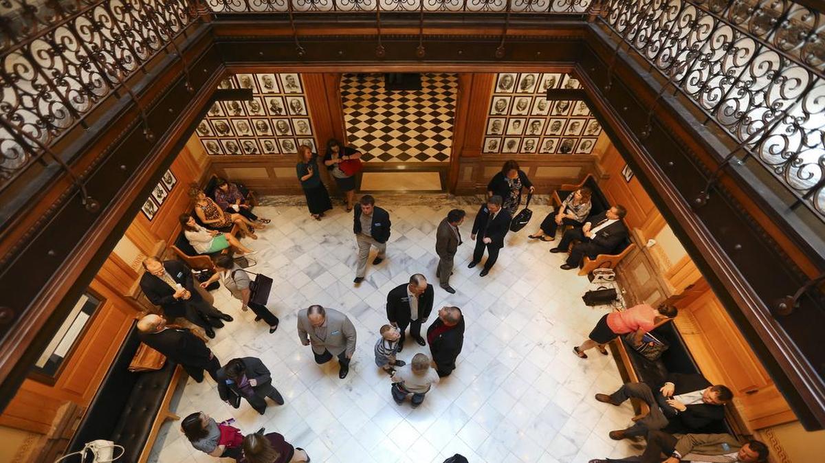 
Representatives and lobbyists congregated Monday outside the Kansas House chamber shortly after recess was called for further negotiations on a tax bill. The Legislature’s 2015 session will last at least 110 days — the longest in history — after the recess was called. Negotiators from the House plan to meet with their counterparts from the Senate on Tuesday morning.

