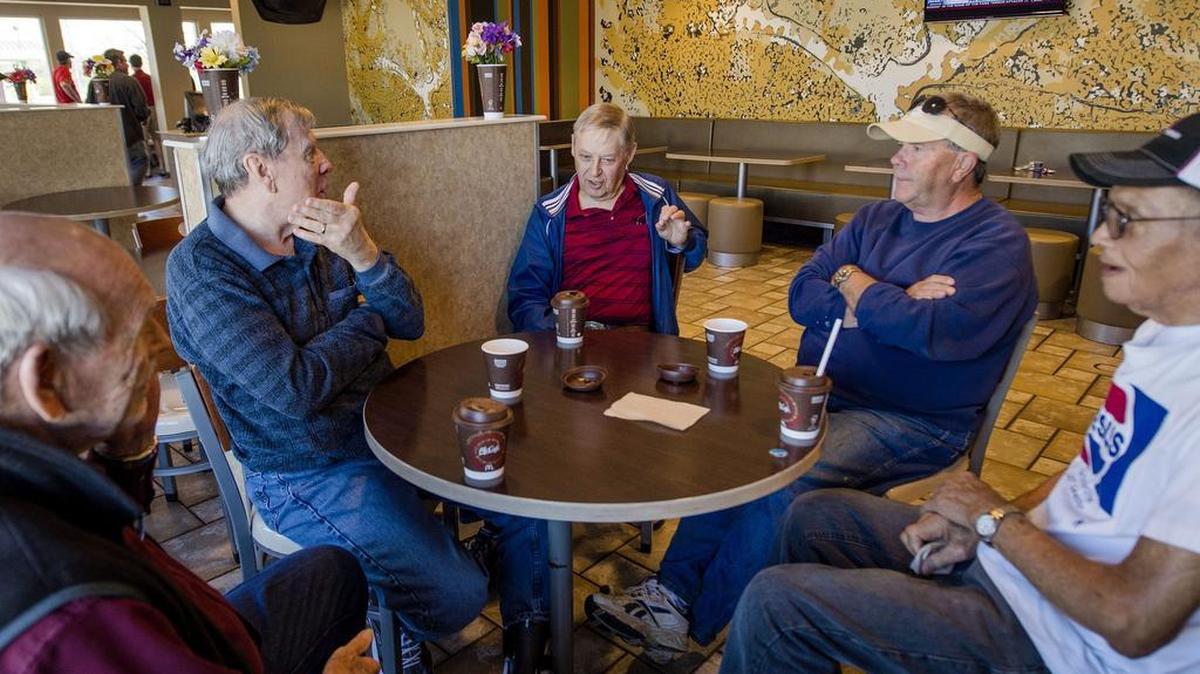 Thom Burg (from left), Tom Taylor, Larry Foster, Arnold Hannah and Troy Burton talked Friday about a variety of topics, including politics, over coffee at a McDonald’s restaurant in rural Butler, Mo.