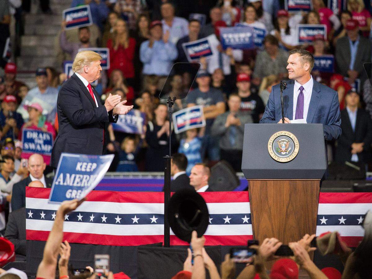 Kris Kobach appeared with former President Donald Trump during a 2018 rally in Topeka. As Kansas’ attorney general, Kobach is expected to return to pursuing voter fraud and immigration issues.