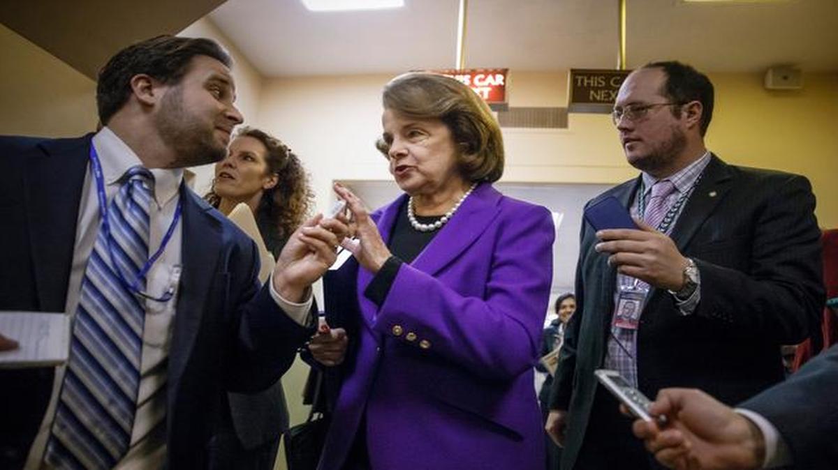 
Intelligence Committee Chairwoman Sen. Dianne Feinstein was pursued by reporters Tuesday on Capitol Hill in Washington as she arrived to release a report on the CIA’s harsh interrogation techniques at secret overseas facilities after the 9/11 terror attacks.
