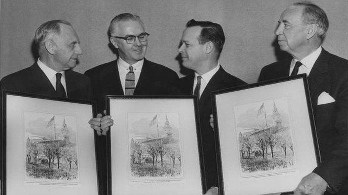 This 1961 photo shows U.S. Sen. Andrew F. Schoeppel (far right), Gov. John Anderson (second from right) and U.S. Sen. Frank Carlson (far left) holding framed engravings of President Abraham Lincoln’s raising of the 34-star flag.