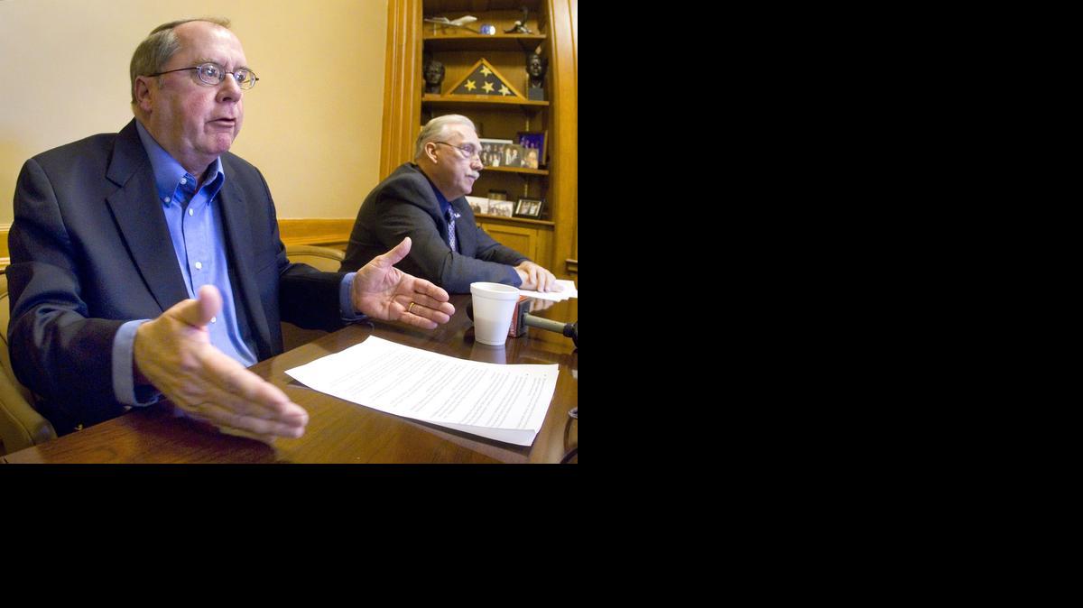 
Senate Minority Leader Anthony Hensley, D-Topeka, left and House Minority Leader Tom Burroughs D-Kansas City, talks to reporters Friday 
