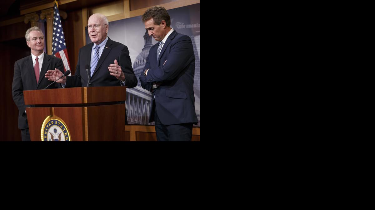 
From left, Rep. Chris Van Hollen, D-Md., Sen. Patrick Leahy, D-Vt., and Sen. Jeff Flake, R-Ariz., participate in a news conference on Capitol Hill Wednesday after traveling to Havana.
