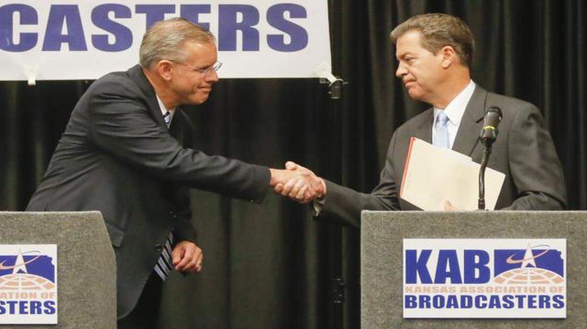 
On Tuesday, either Paul Davis or Sam Brownback will emerge as Kansas governor. 
