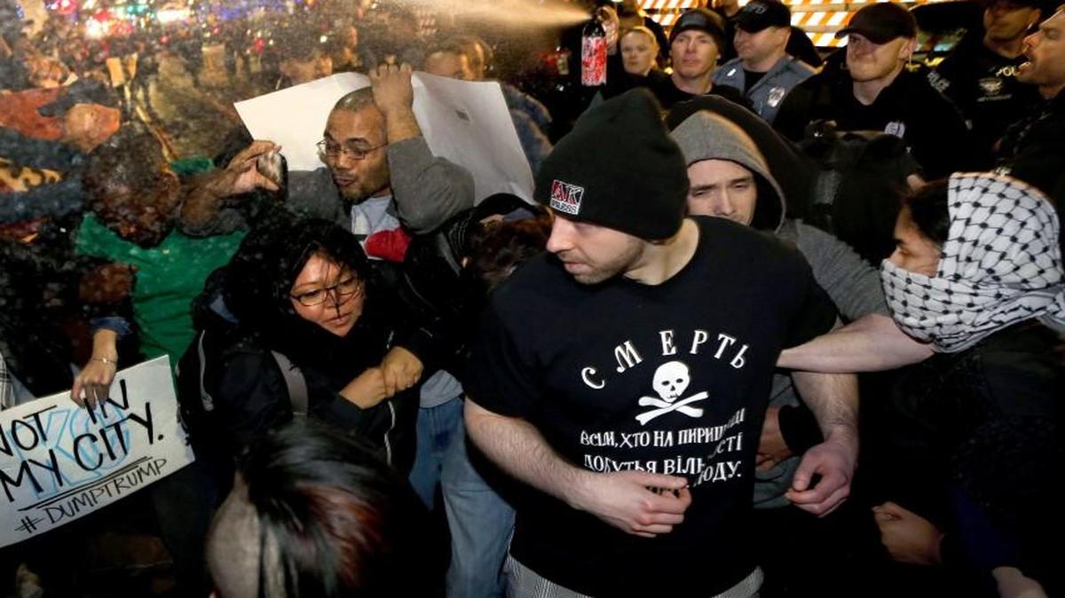 Police pepper-sprayed a crowd of protesters outside the Arvest Theatre at The Midland, where Donald Trump was speaking to supporters on Saturday.