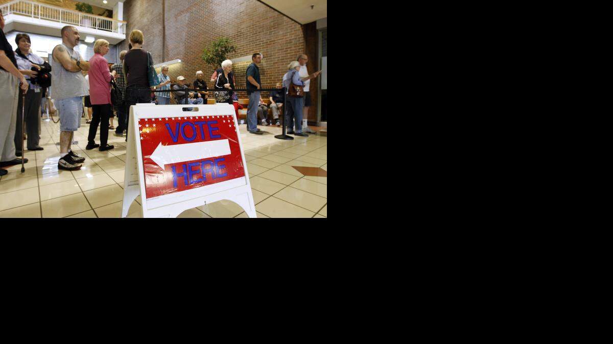 
Johnson County residents will again line up at the polls on Tuesday. But unlike in the 2012 election (seen here), voters are separated into two classes depending on which form they used to register. The system is tied to proof-of-citizenship requirements for registering to vote in Kansas. 

