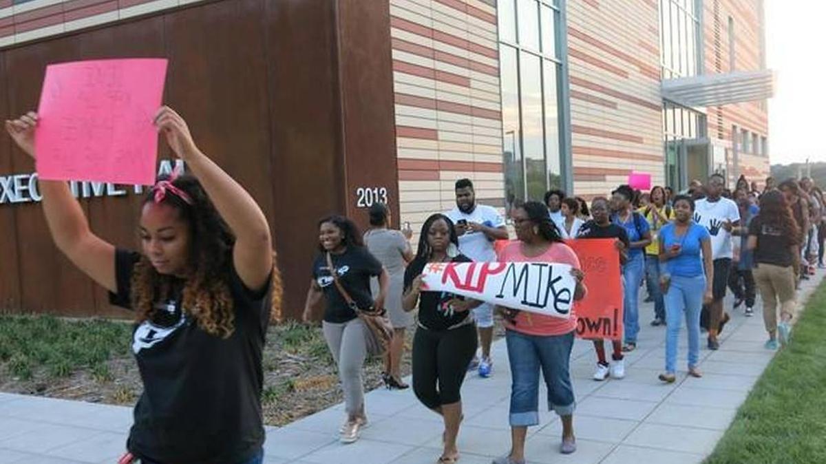 In 2014, students at the University of Missouri-Kansas City marched through campus holding placards after the Ferguson, Mo., shooting of teenager Michael Brown.