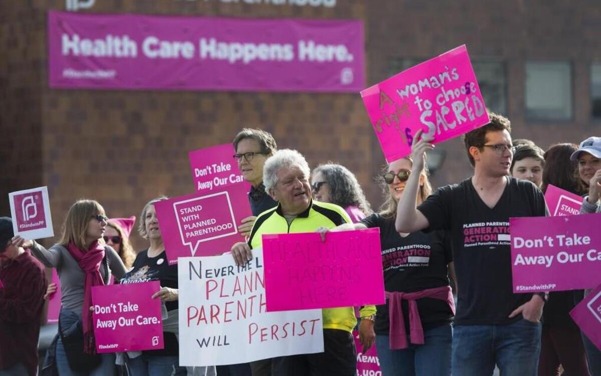 Supporters of Planned Parenthood rallied peacefully in February outside the facility in Overland Park.