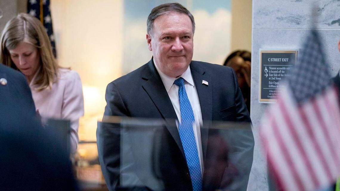 Secretary of State nominee Mike Pompeo leaves a meeting with Sen. Angus King, Ind.-Maine, on Capitol Hill in Washington on Monday.