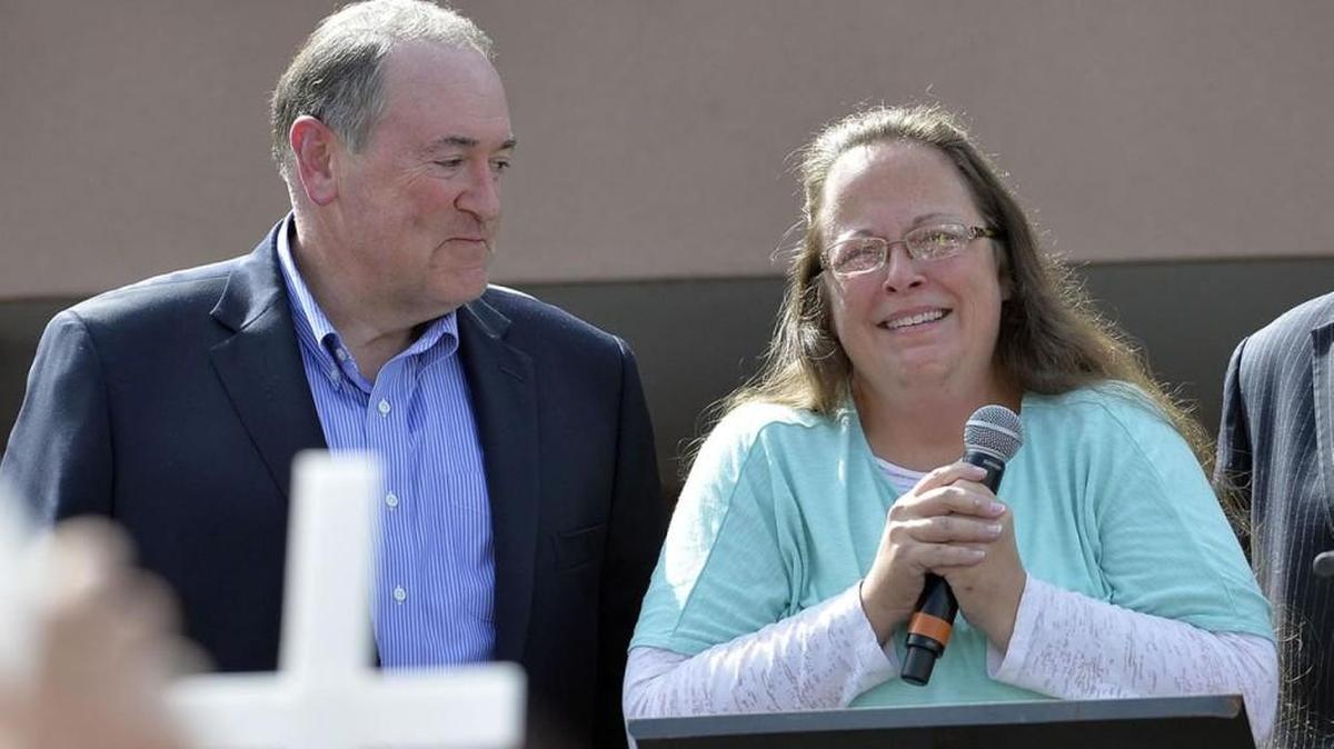 GOP presidential candidate Mike Huckabee and Kim Davis