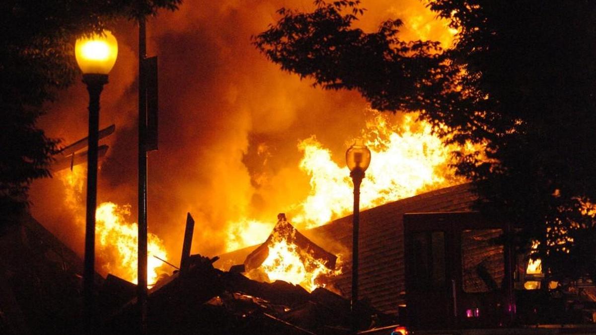 A building that burned Oct. 12 on Independence Boulevard in Kansas City collapsed, killing two firefighters.