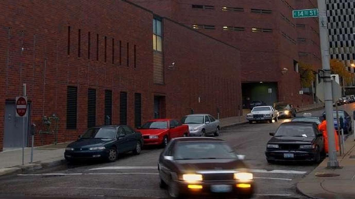 A former Jackson County jail inmate says in a new lawsuit that a guard did nothing to stop a fellow male inmate from raping him last September.