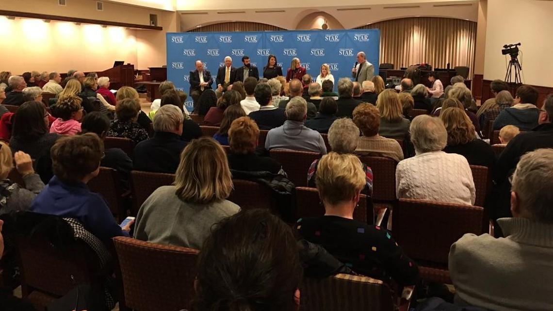 About 140 people turned out to hear a discussion on secrecy in Kansas government. Lawmakers, journalists and legal experts were panelists at the town hall meeting.