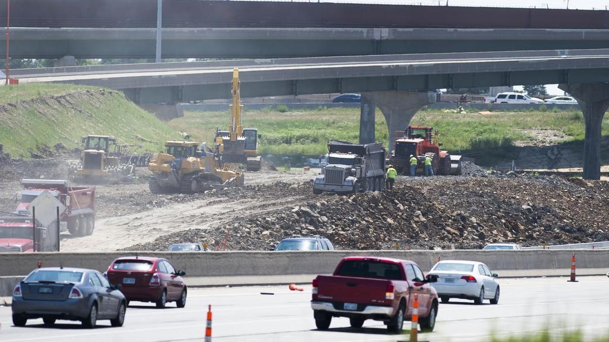 
Dust rose from dump trucks and earthmovers Friday as construction continued at the corridor of Interstates 35 and 435 in Lenexa. Congressional failure to pass a long-term transportation bill won’t affect current highway construction in Missouri or Kansas, but officials in the two states say it would cripple future projects.
