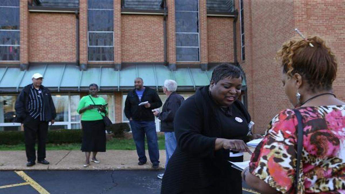 
Ferguson City Council Ward 1 candidate Adrienne Hawkins talked to Anquay Barrett before Barrett cast her ballot Tuesday at St. Peter’s United Church of Christ in Ferguson, Mo.
