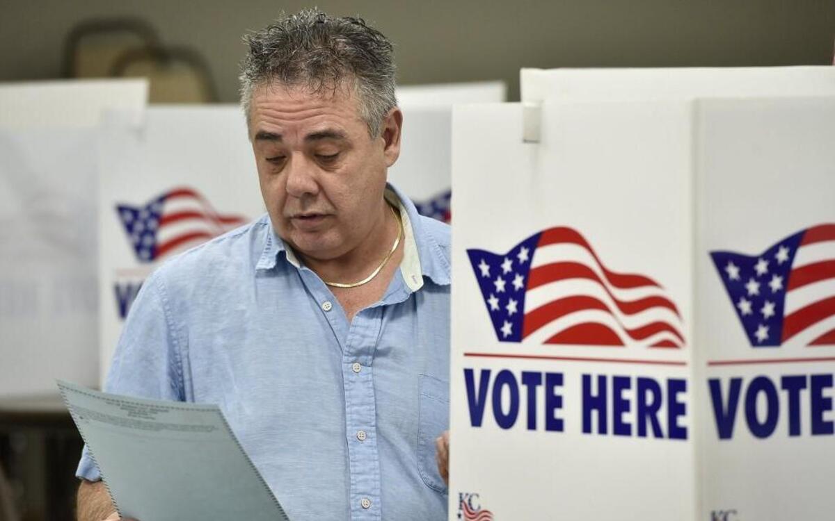 Clark Cordova double-checked his ballot before submitting it at his polling station, St. Paul's Episcopal Church, while voting in Missouri’s Aug. 2 primary election. Missouri voters will decide on a range of issues Nov. 8, including tobacco taxes, the requirement of photo identification to vote, campaign contribution limits, the prohibition of new forms of sales taxes and renewal of a tax for state parks.