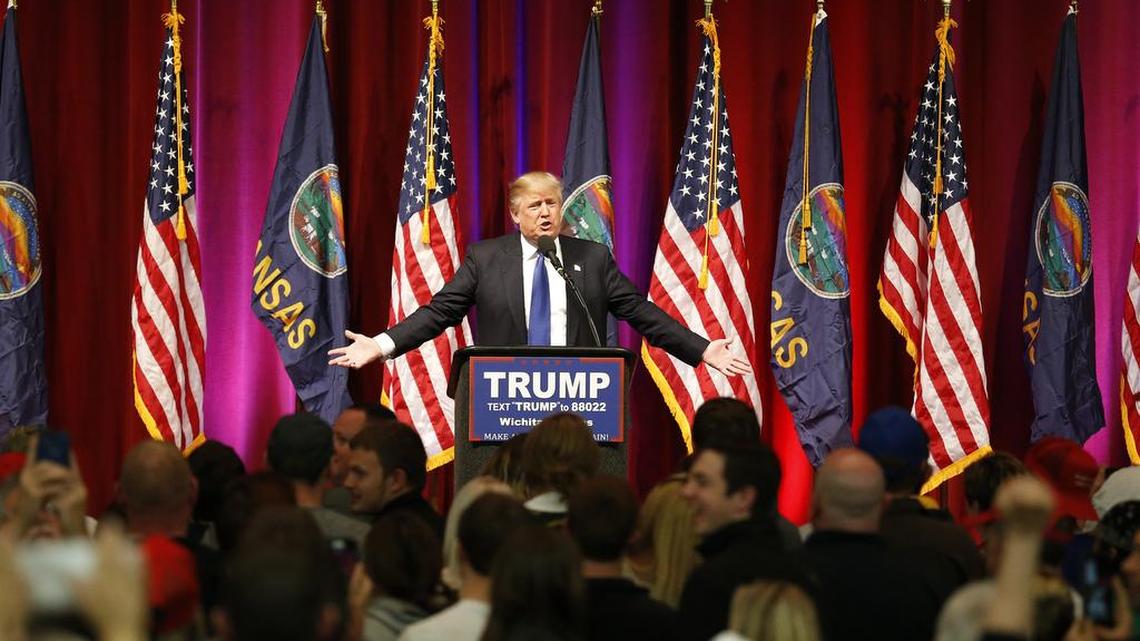 Donald Trump addresses his supporters at rally before the start of the Kansas GOP caucus in Wichita on March 5, 2016.