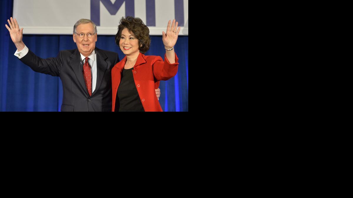 
Sen. Mitch McConnell of Kentucky and his wife, former Secretary of Labor Elaine Chao, waved to a gathering of supporters at his victory celebration Tuesay in Louisville.

