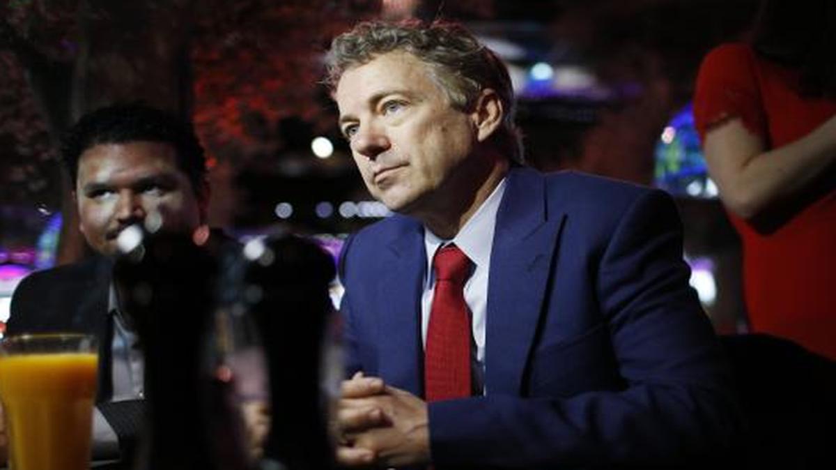 
Sen. Rand Paul, R-Ky.speaks with people at a restaurant in Las Vegas
