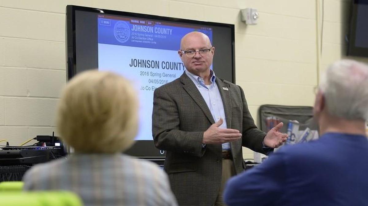 In March, Election Commission Ronnie Metsker (right) talked to a small group of election workers during a training class at the Johnson County Election Office in Olathe. After Wednesday’s delayed election results, Metsker said he told workers, “Here’s to never having an election like this ever, ever again.”