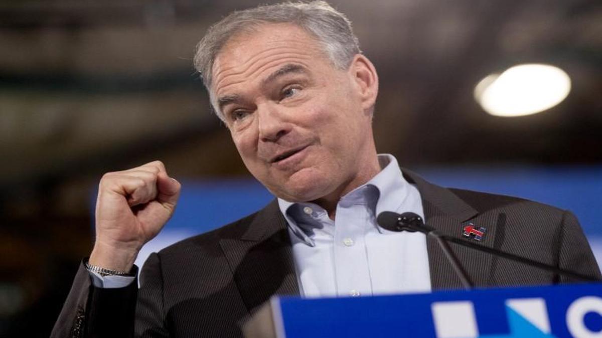 Sen. Tim Kaine, D-Va., accompanied by Democratic presidential candidate Hillary Clinton speaks at a rally at Florida International University Panther Arena in Miami, Saturday, July 23, 2016, the day after Clinton chose Kaine to be her running mate.