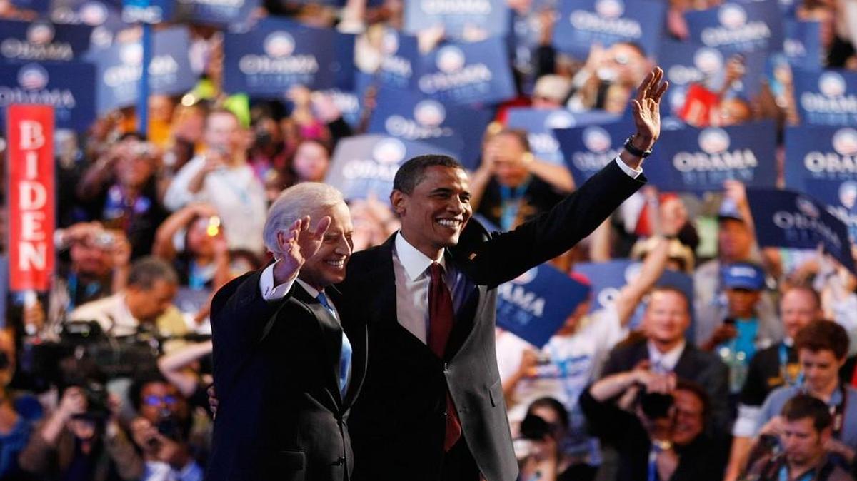 Then-presidential nominee Sen. Barack Obama and his running mate, Sen. Joe Biden, wave to the crowd at the Democratic National Convention in Denver, Colo., in August 2008.