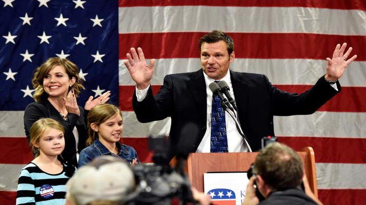 
At his victory speech in Topeka on Tuesday night, Kansas Secretary of State Kris Kobach appeared with his wife, Heather, and daughters Lillian, 11, and Reagan, 9. The race was a referendum on his hotly contested policies, he said. 
